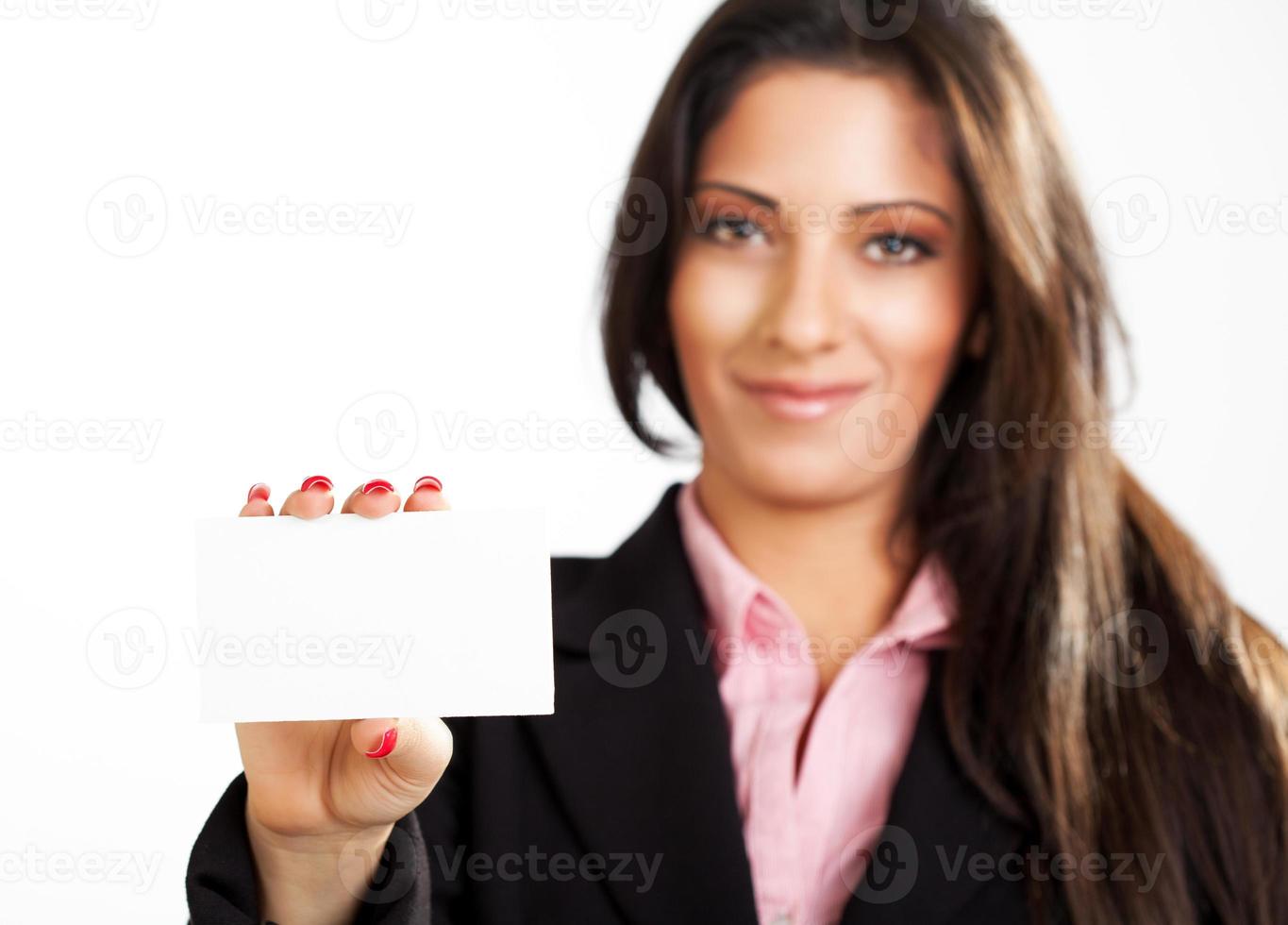 Businesswoman holding card photo