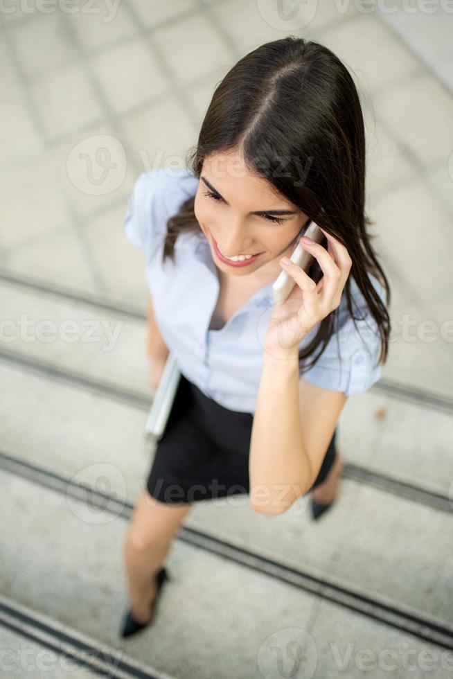 Businesswoman Using Mobile Phone photo