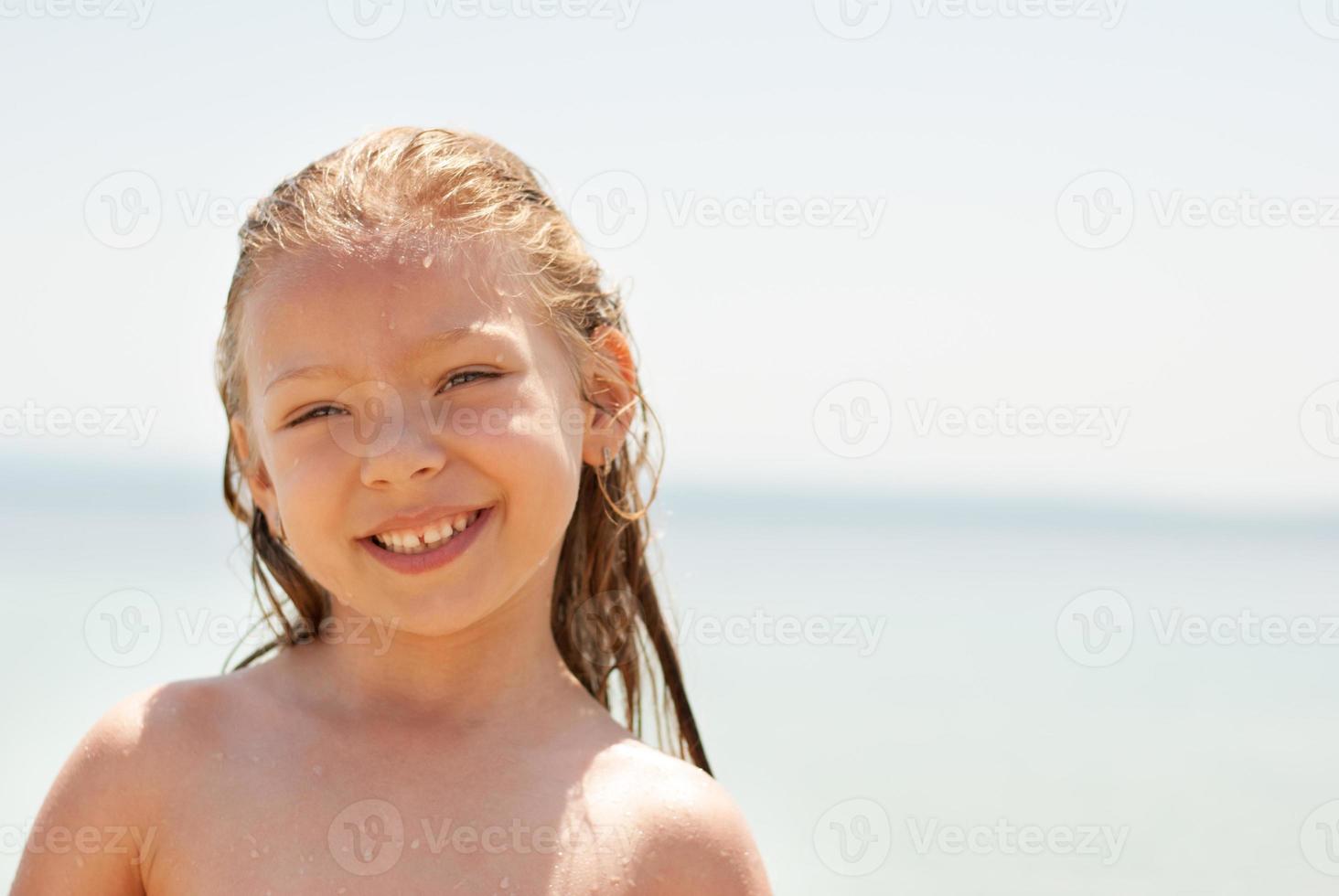 Little girl at beach photo