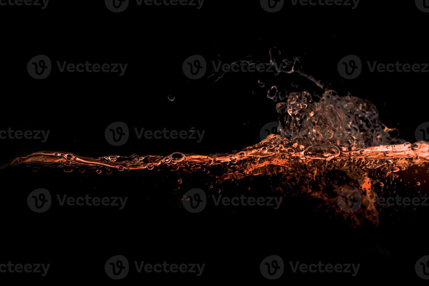 big wave of oil with  black background photo