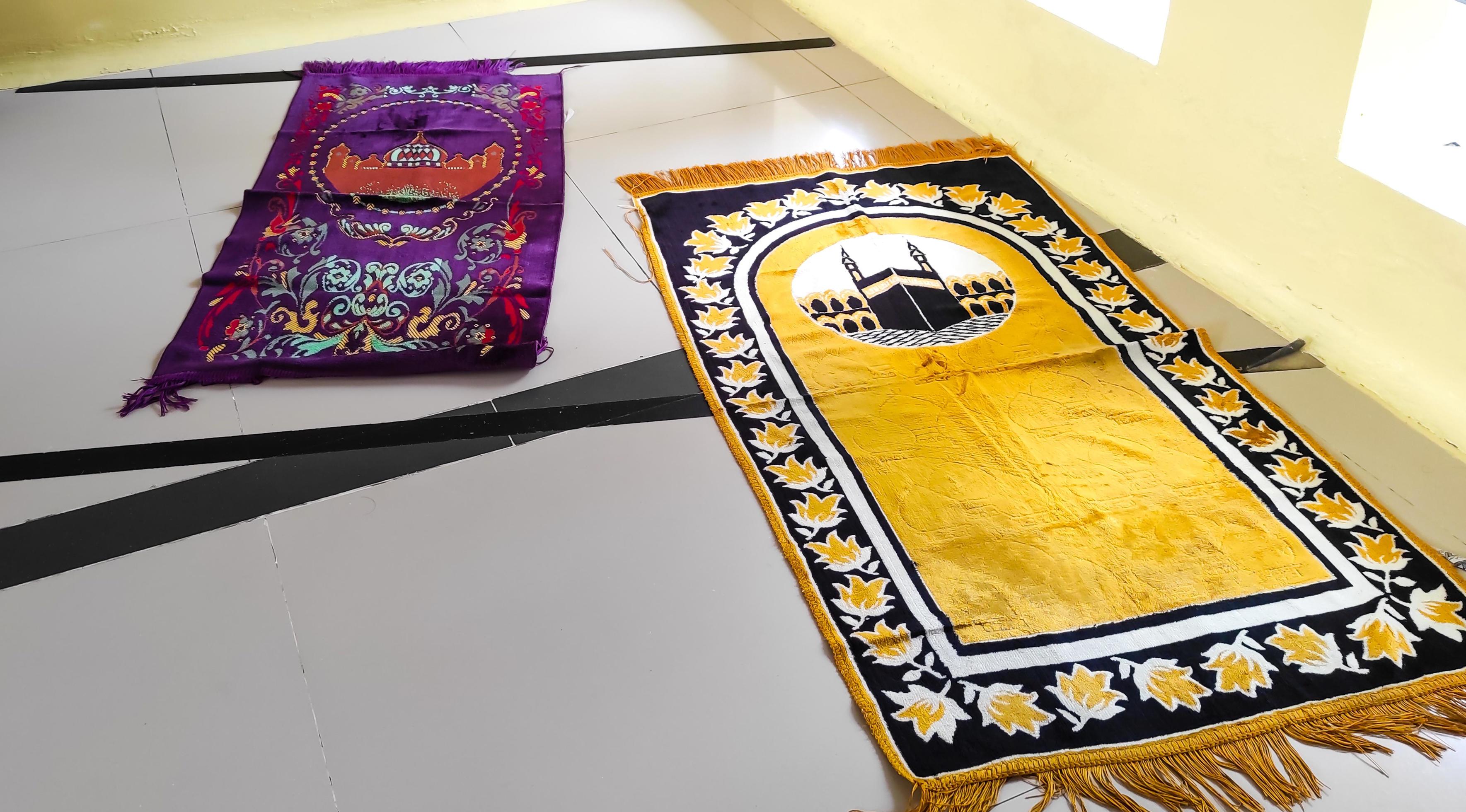 closeup photo of 2 stretched prayer mats 14238182 Stock Photo at Vecteezy
