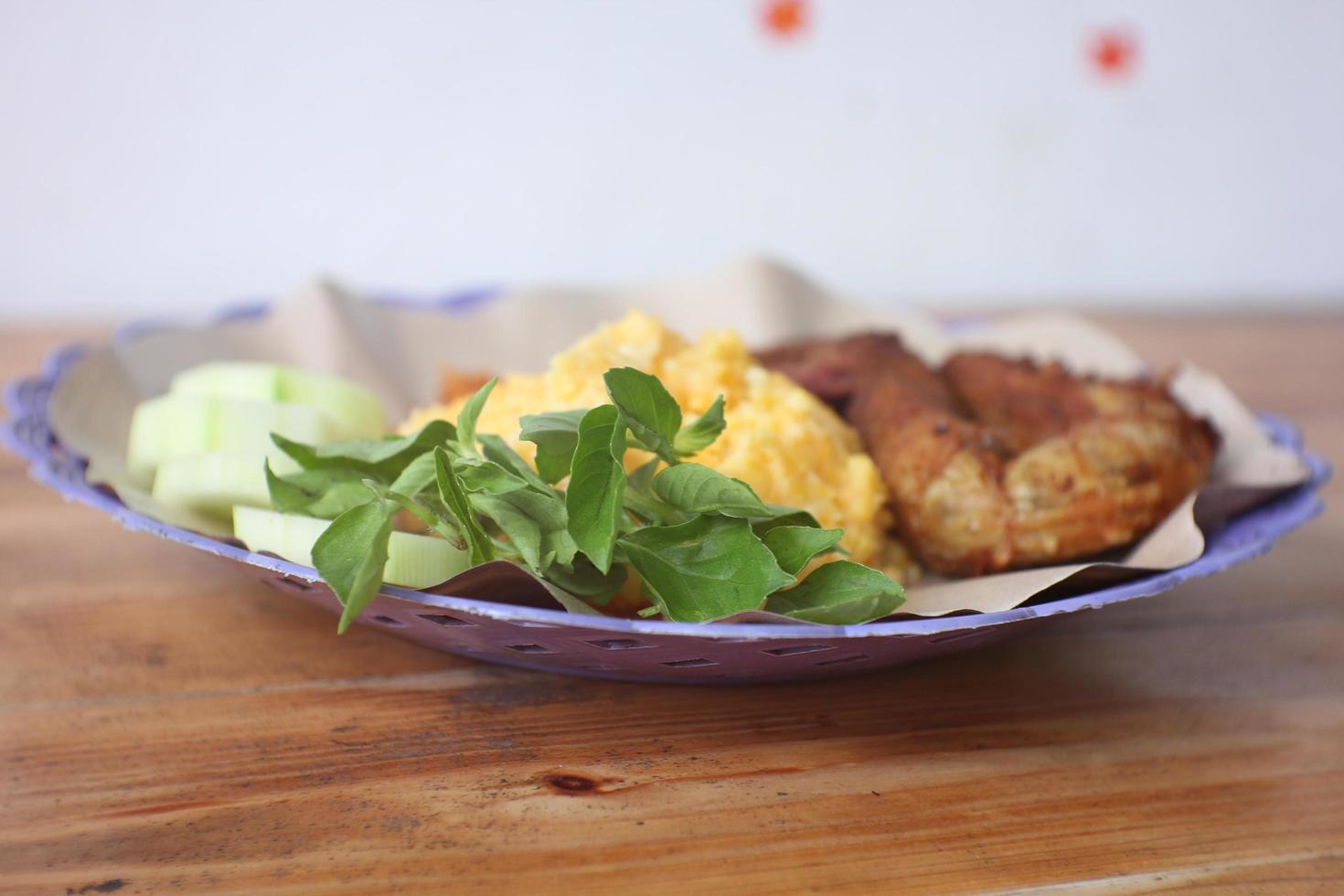 yellow rice and fried chicken head photo