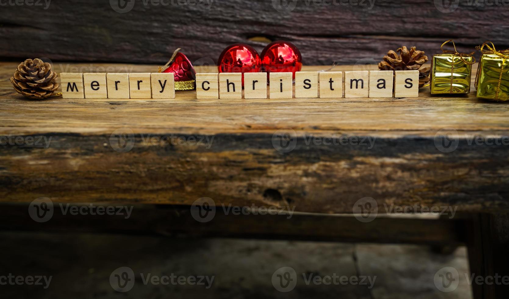 Merry Christmas.  wooden letters merry christmas word  on old wooden background photo