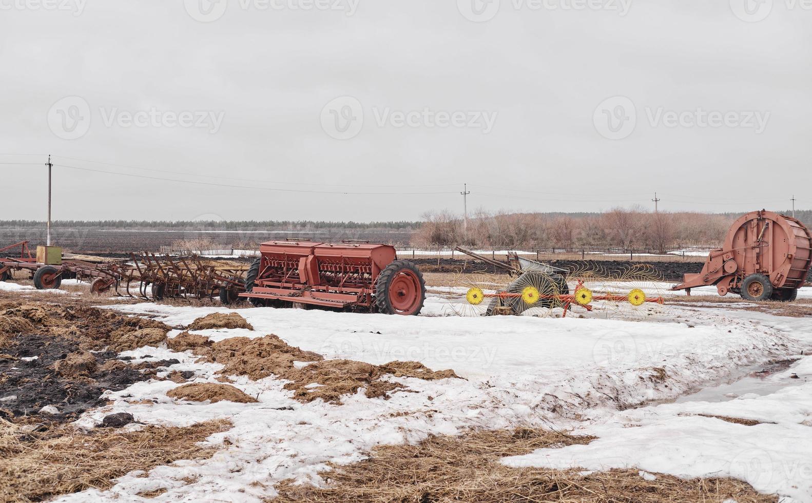 Hitch for tractors and combines. Trailers for agricultural machinery.The machine for gathering hay. photo