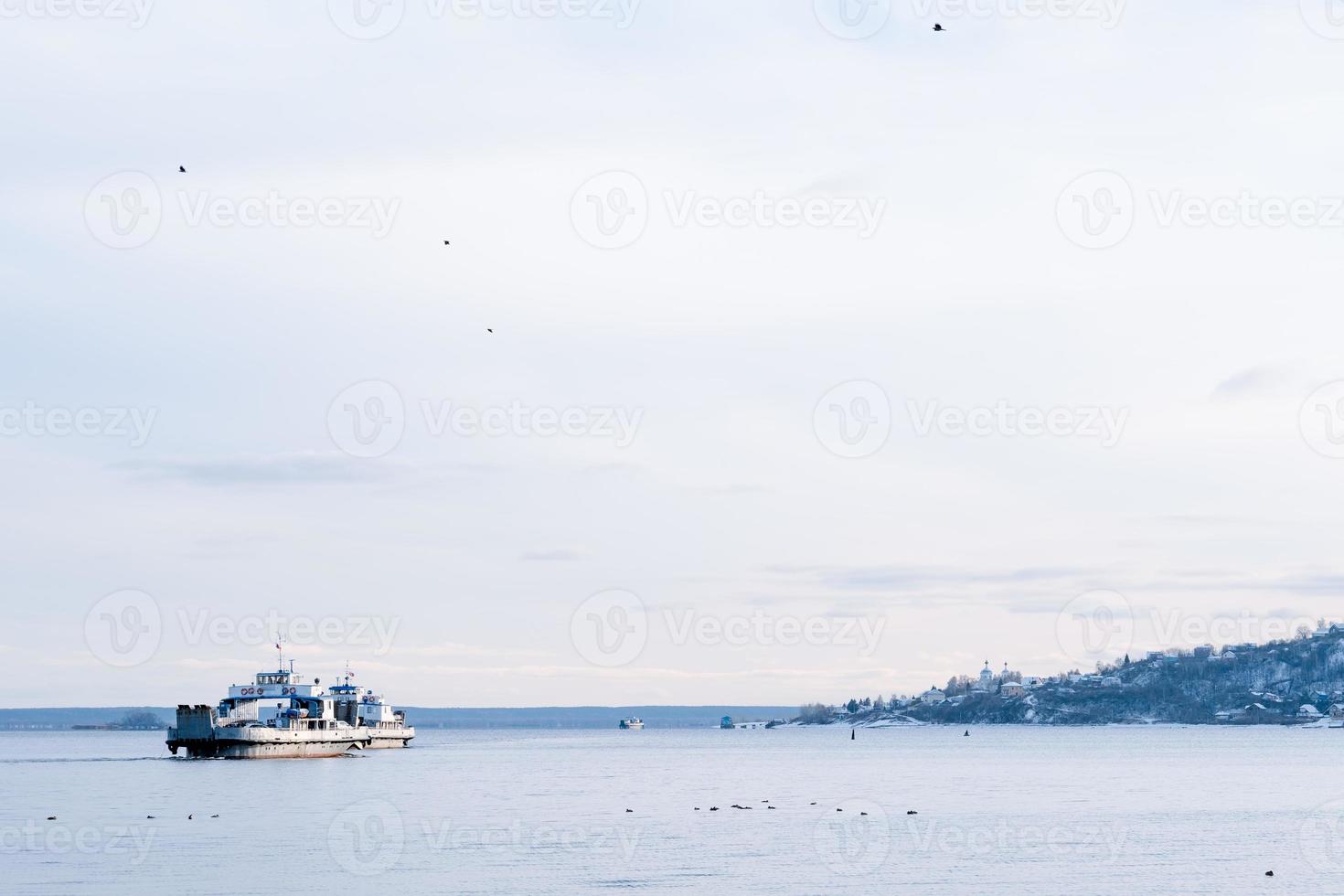 fishing boats in the sea. ferry on the winter sea. Winter sea landscape photo