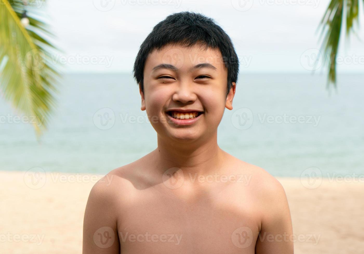 Portrait of boy on the beach. photo