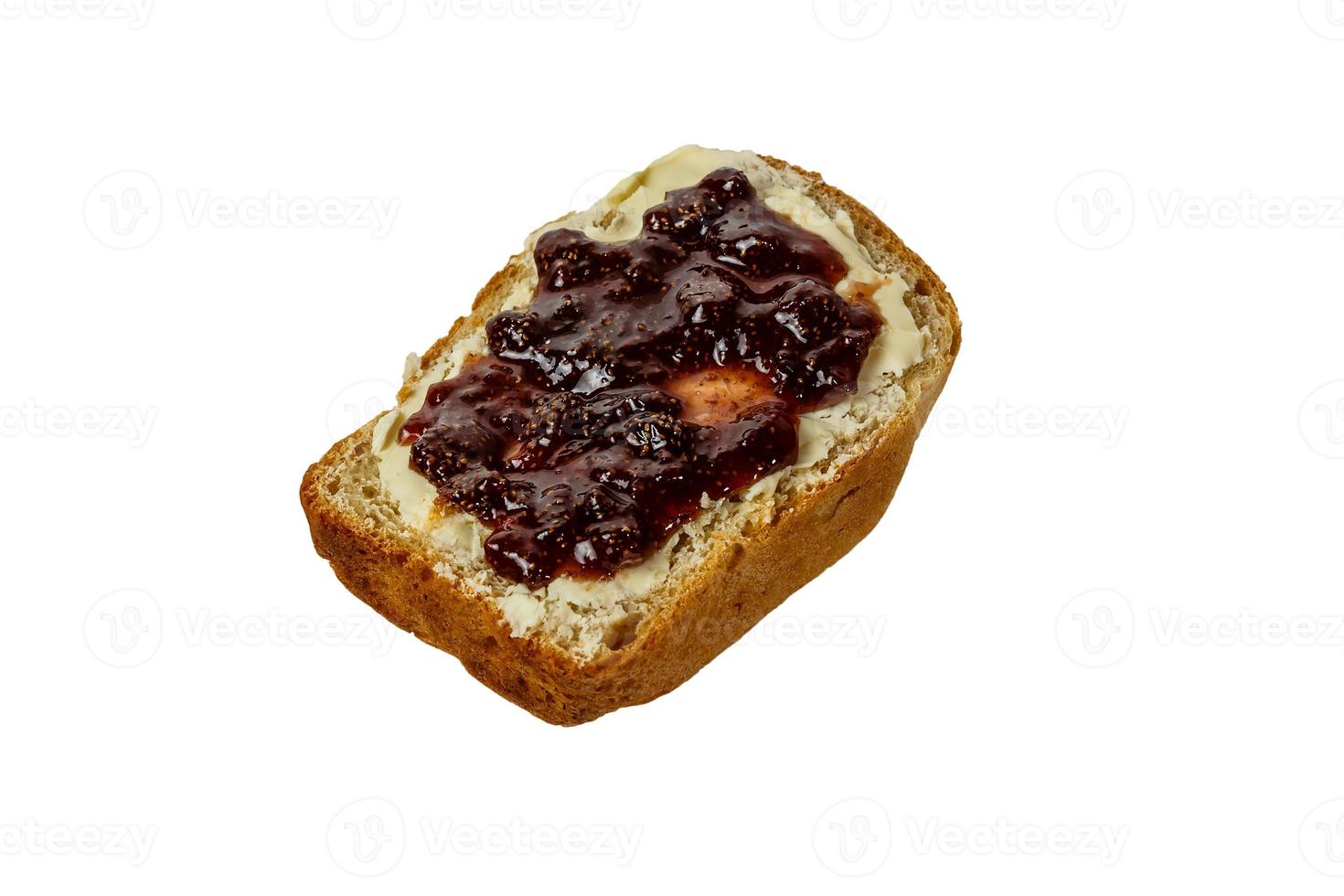 slice of white bread with butter and strawberry jam isolated 14246571