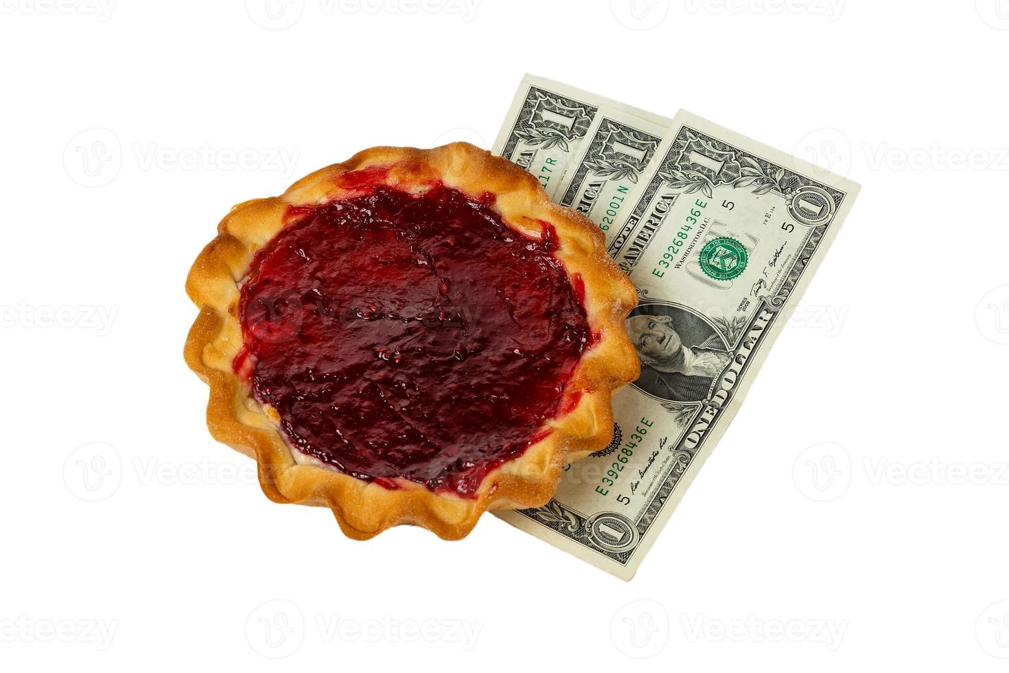 pie with curd filling and raspberries and three dollars on a white background photo