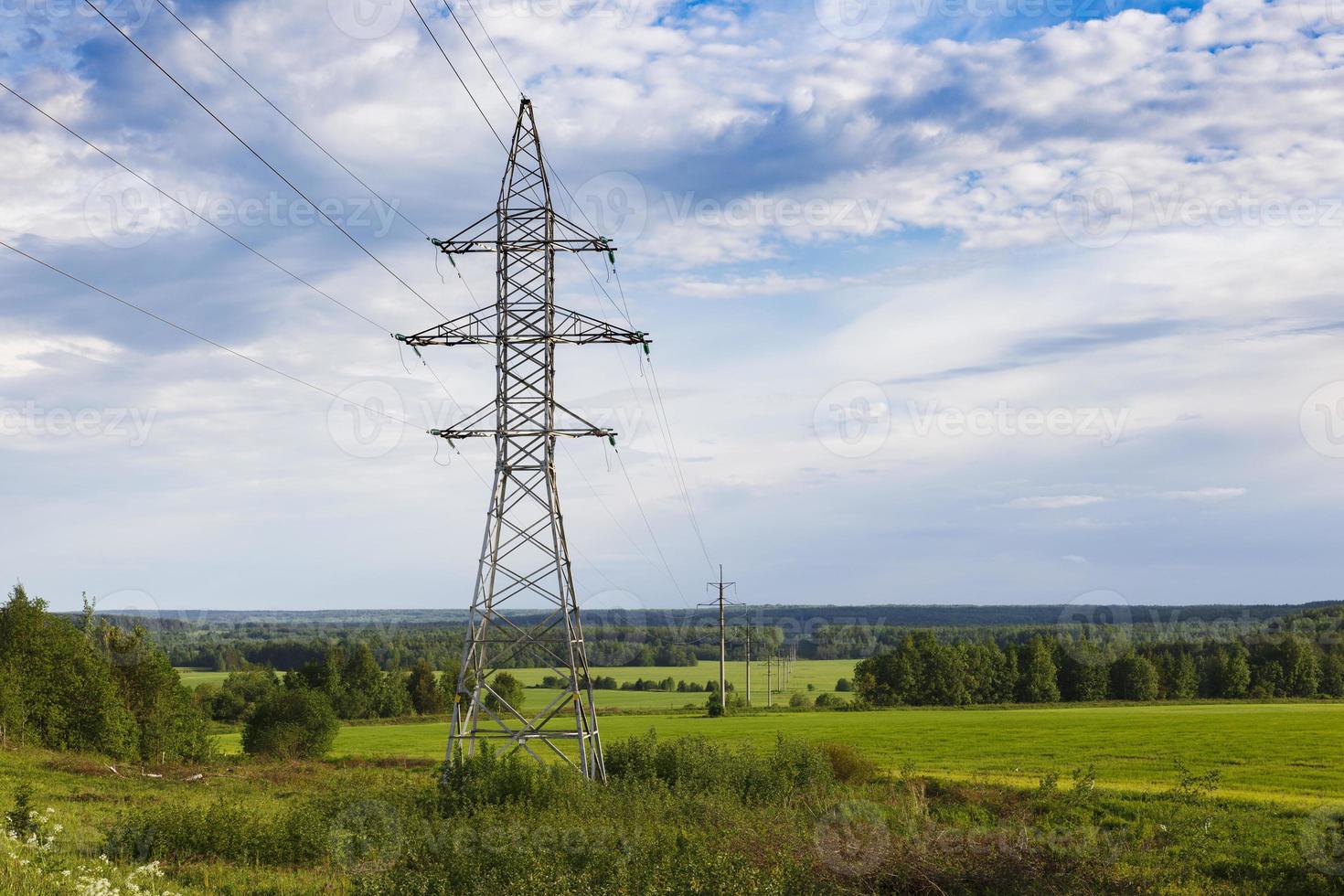 Support of high-voltage transmission line against the sky photo