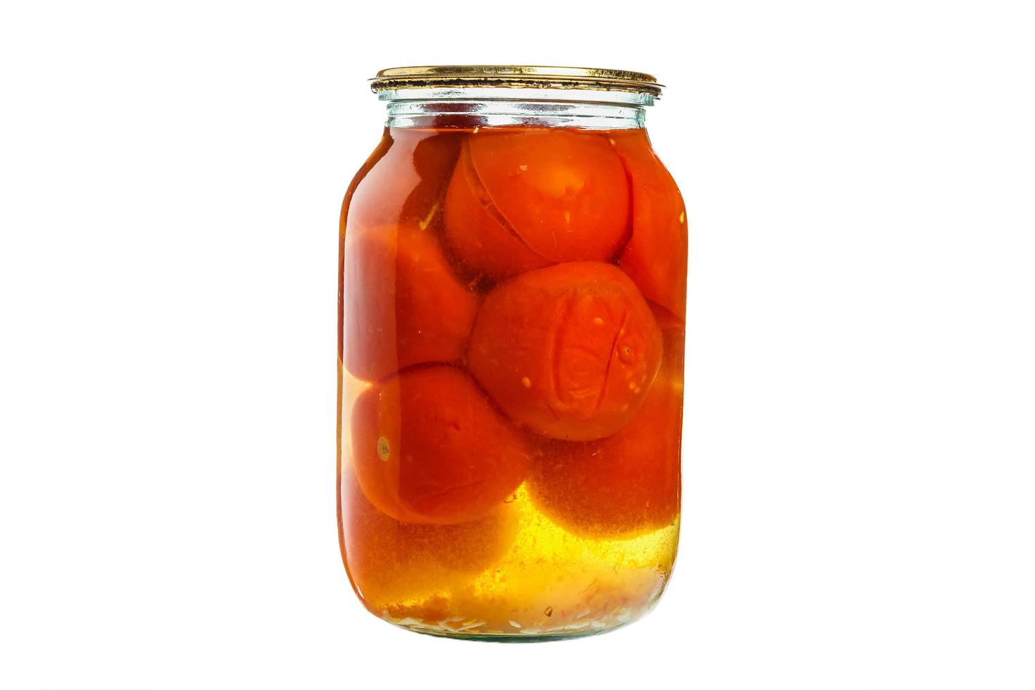 tomatoes vegetables canned in glass jars on a white background photo