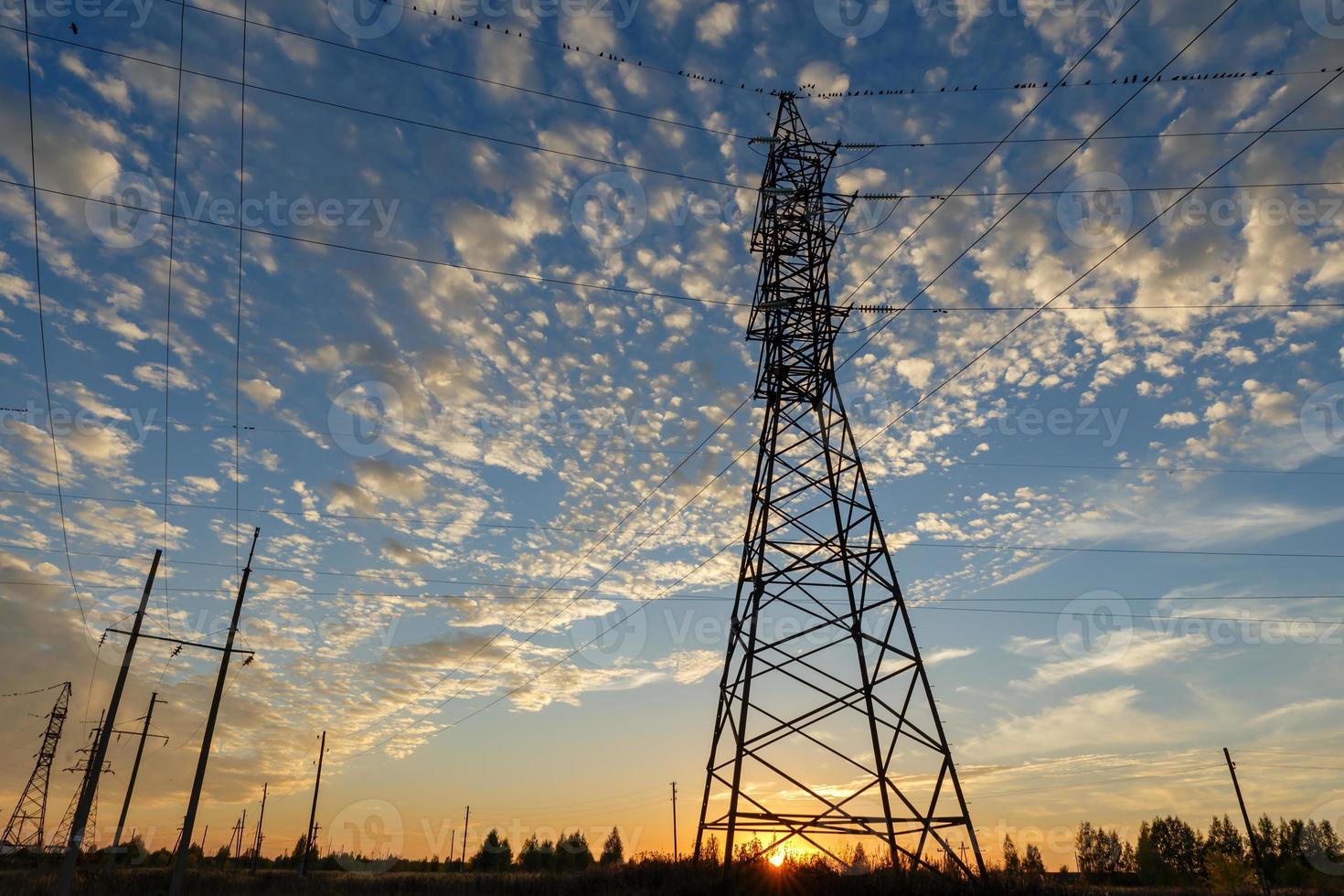 High voltage power line, Power line support at sunset photo