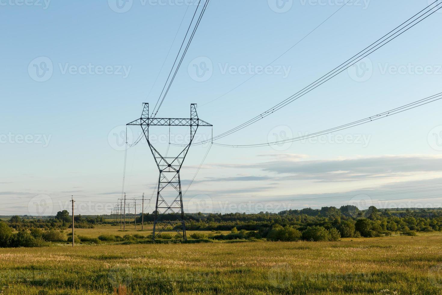 support of high-voltage power line in the field. photo