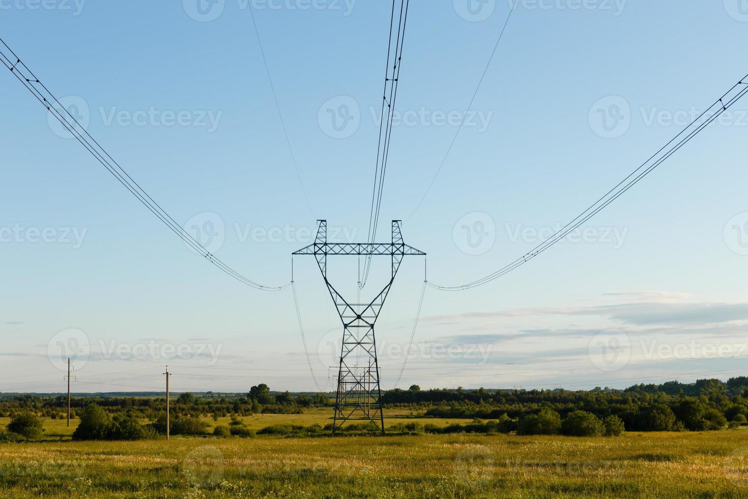 support of high-voltage power line in the field photo