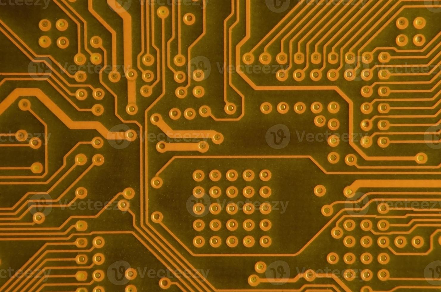 Close up of colored micro circuit board. Abstract technology background photo