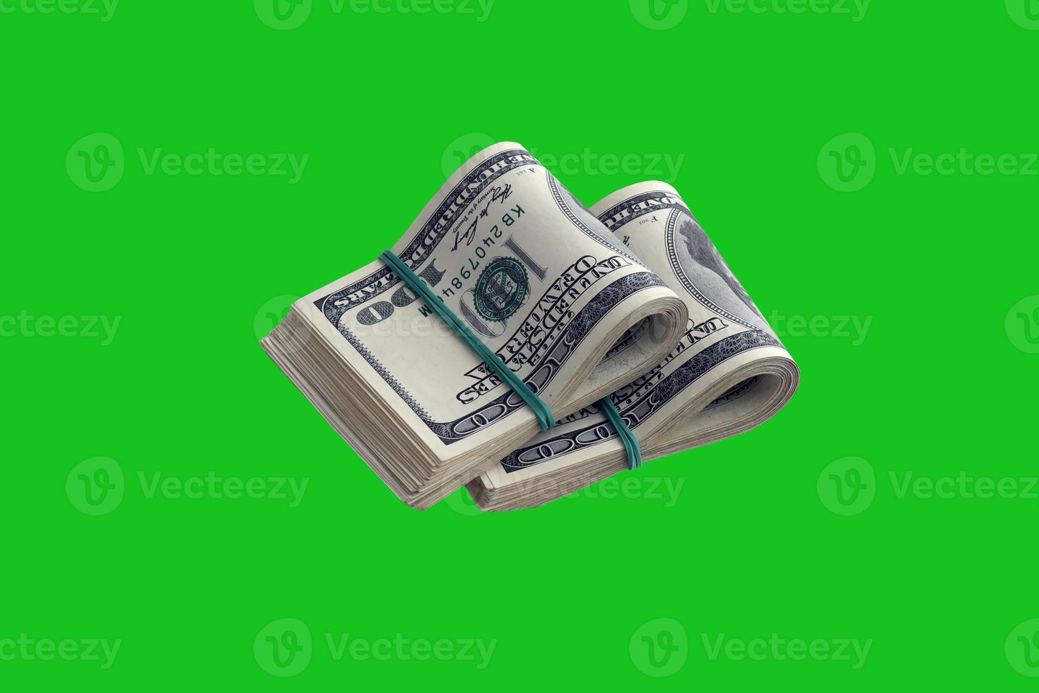 Bundle of US dollar bills isolated on chroma keyer green. Pack of american money with high resolution on perfect green mask photo