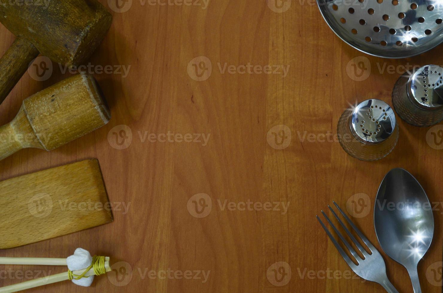 Kitchen appliances on wood background with space for text photo