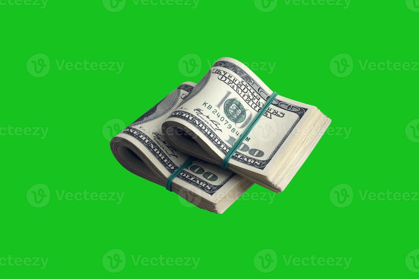 Bundle of US dollar bills isolated on chroma keyer green. Pack of american money with high resolution on perfect green mask photo