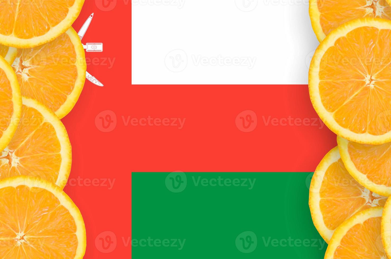 Oman flag  in citrus fruit slices vertical frame photo