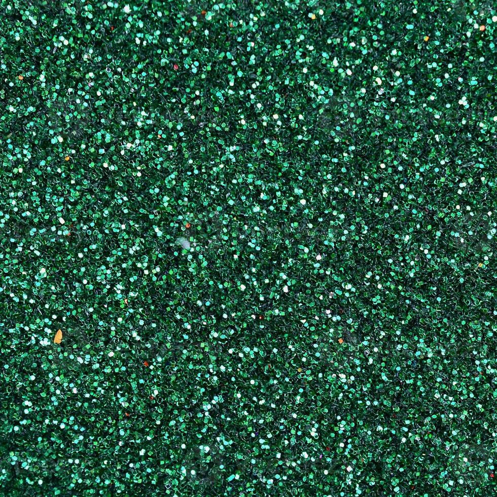 colorido fondo verde esmeralda desenfocado con manchas brillantes y brillantes foto