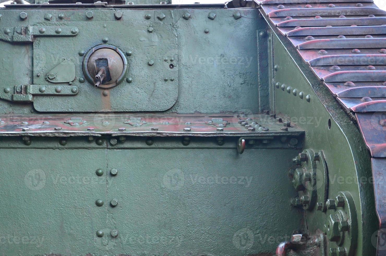 Abstract green industrial metal textured background with rivets and bolts photo