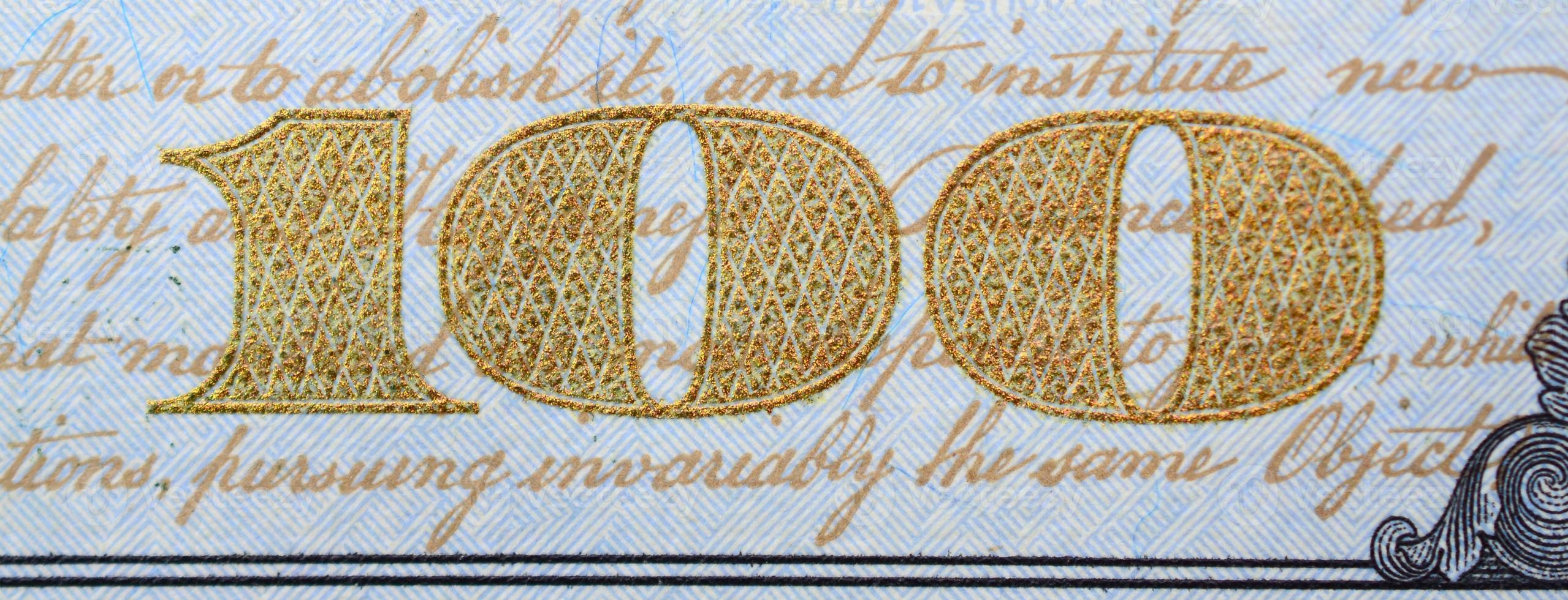 Macro shot. Hundred US dollar bill close up photo