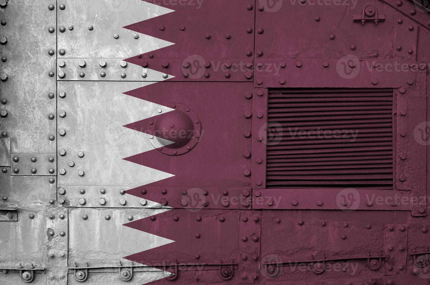 Qatar flag depicted on side part of military armored tank closeup. Army forces conceptual background photo