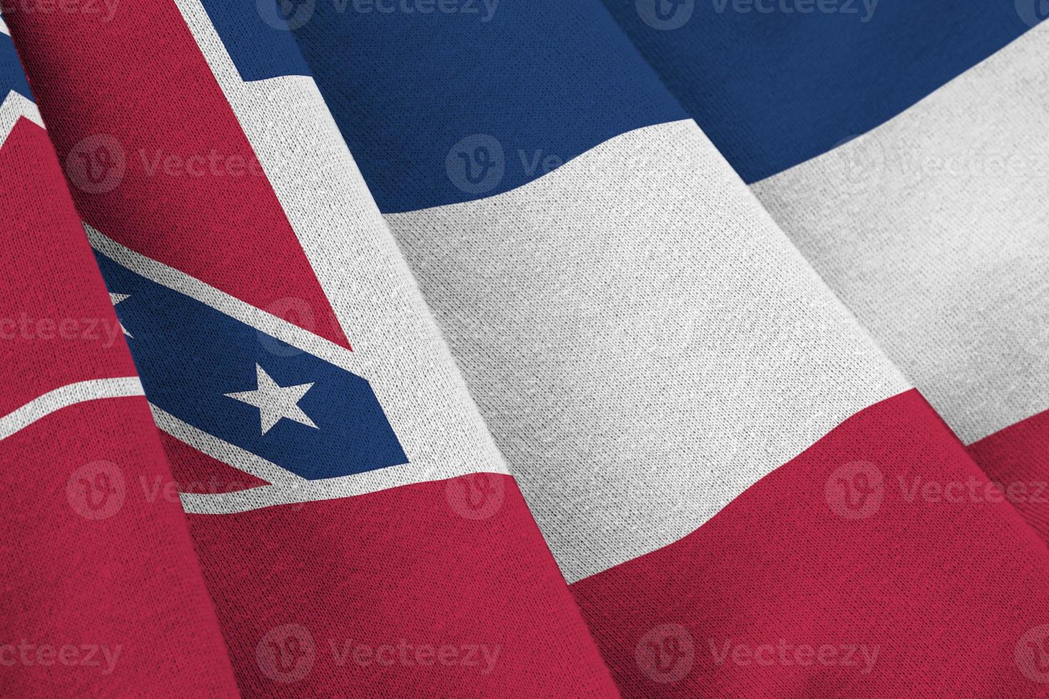 Mississippi new US state flag with big folds waving close up under the studio light indoors. The official symbols and colors in banner photo