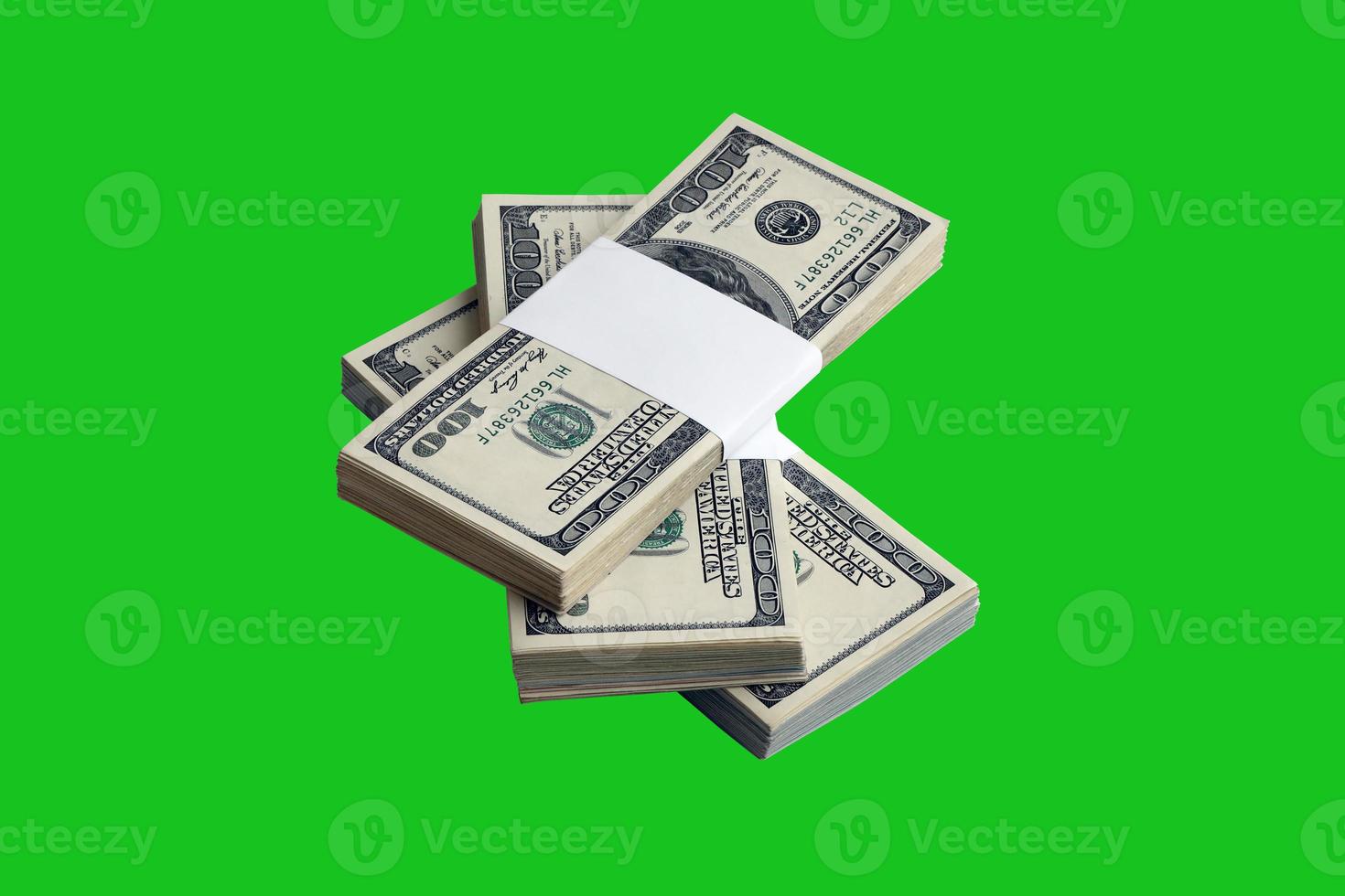 Bundle of US dollar bills isolated on chroma keyer green. Pack of american money with high resolution on perfect green mask photo