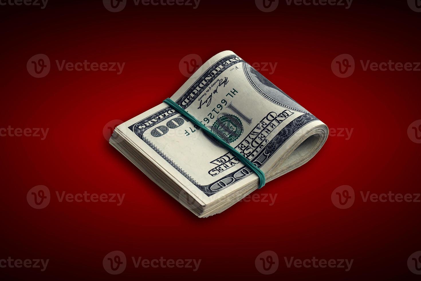 Bundle of US dollar bills isolated on white. Pack of american money with high resolution on perfect white background photo