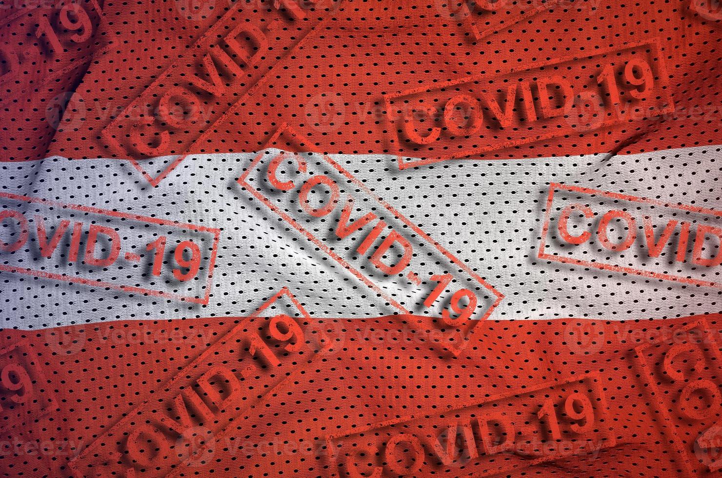 Austria flag and many red Covid-19 stamps. Coronavirus or 2019-nCov virus concept photo
