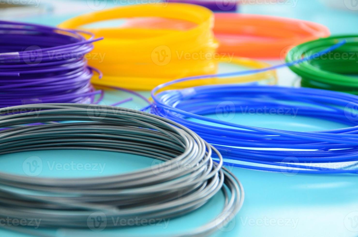 Plastic PLA and ABS filament material for printing on a 3D pen or printer of various colors photo