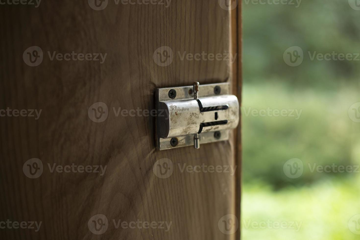 Lock on door. Heckled steel. Bolts on door. Details are included. photo
