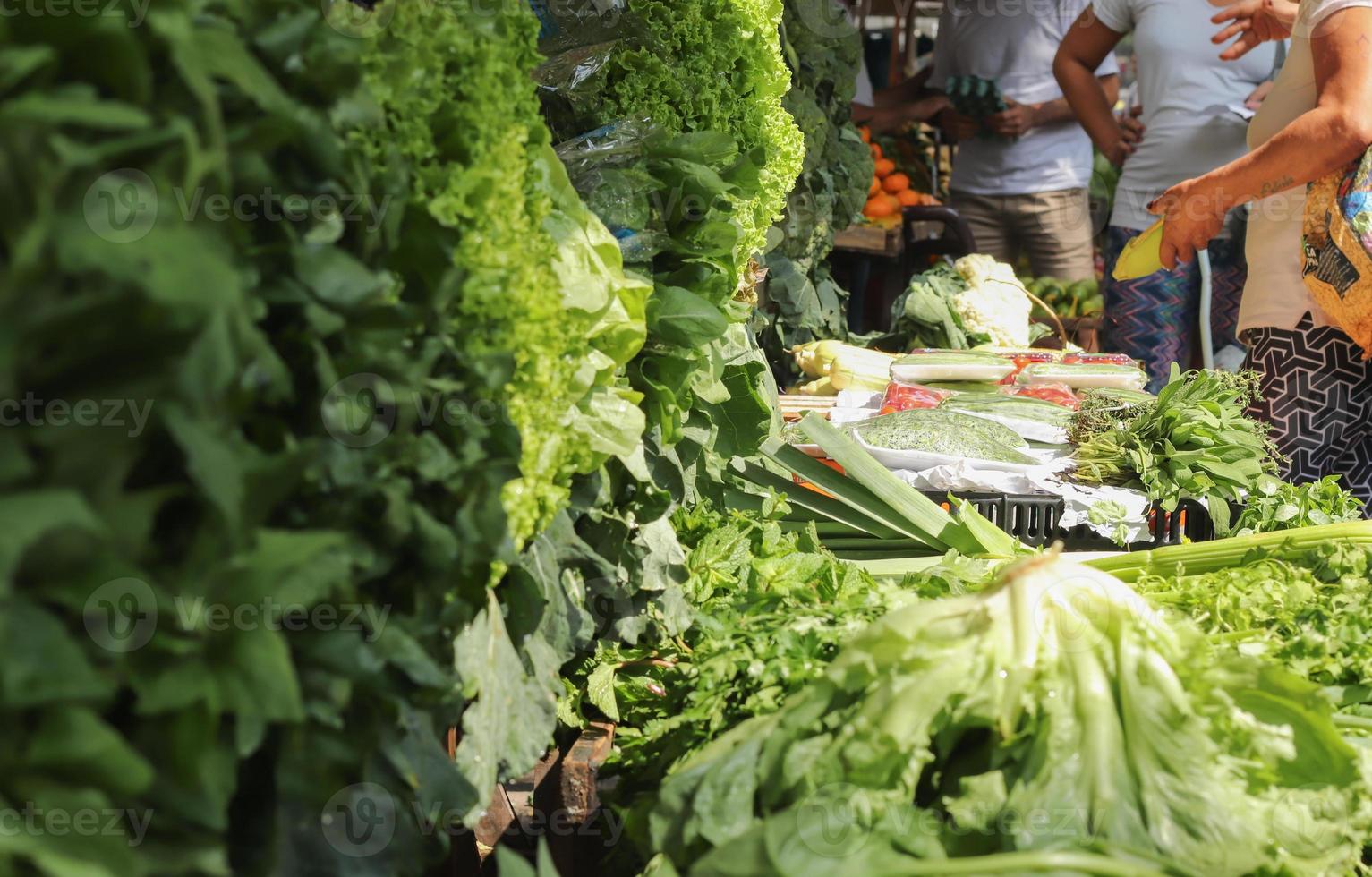 Rio de Janeiro, RJ, Brazil, 2022 - Street fair in Grajau neighborhood - apples, oranges, tangerines, bananas, lettuce, watercress, tomatoes,  bell peppers, flowers photo