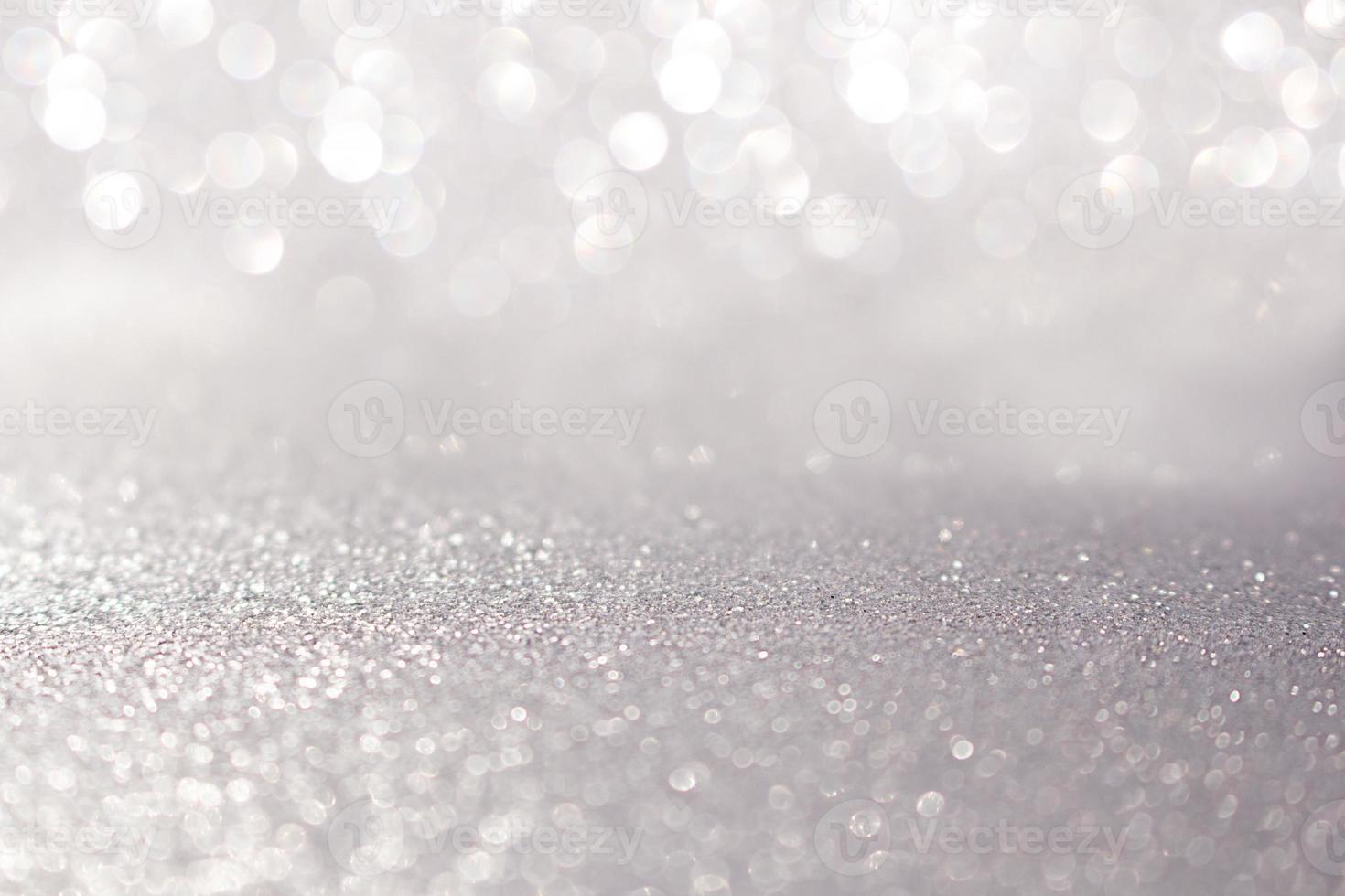 Blurred silver glitter background with sparkle. Christmas, New Year, March 8, birthday, International Women's Day. Copy space photo