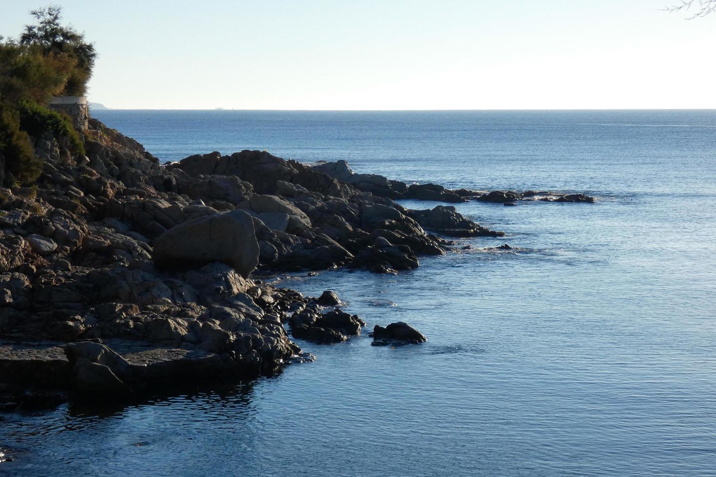 small beach on the catalan costa brava early in the morning photo