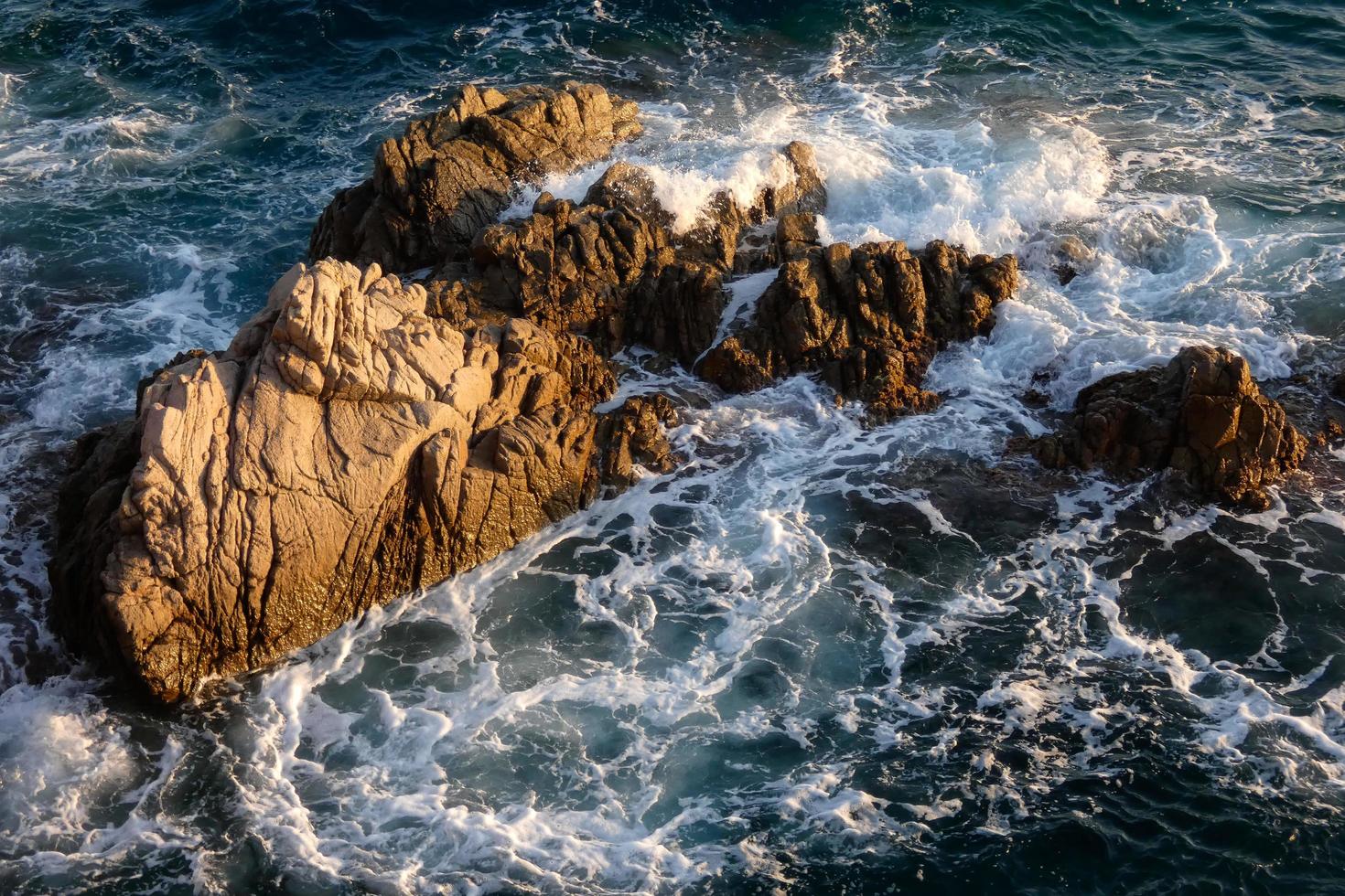 Rocks and sea in the catalan costa brava, mediterranean sea, blue sea photo