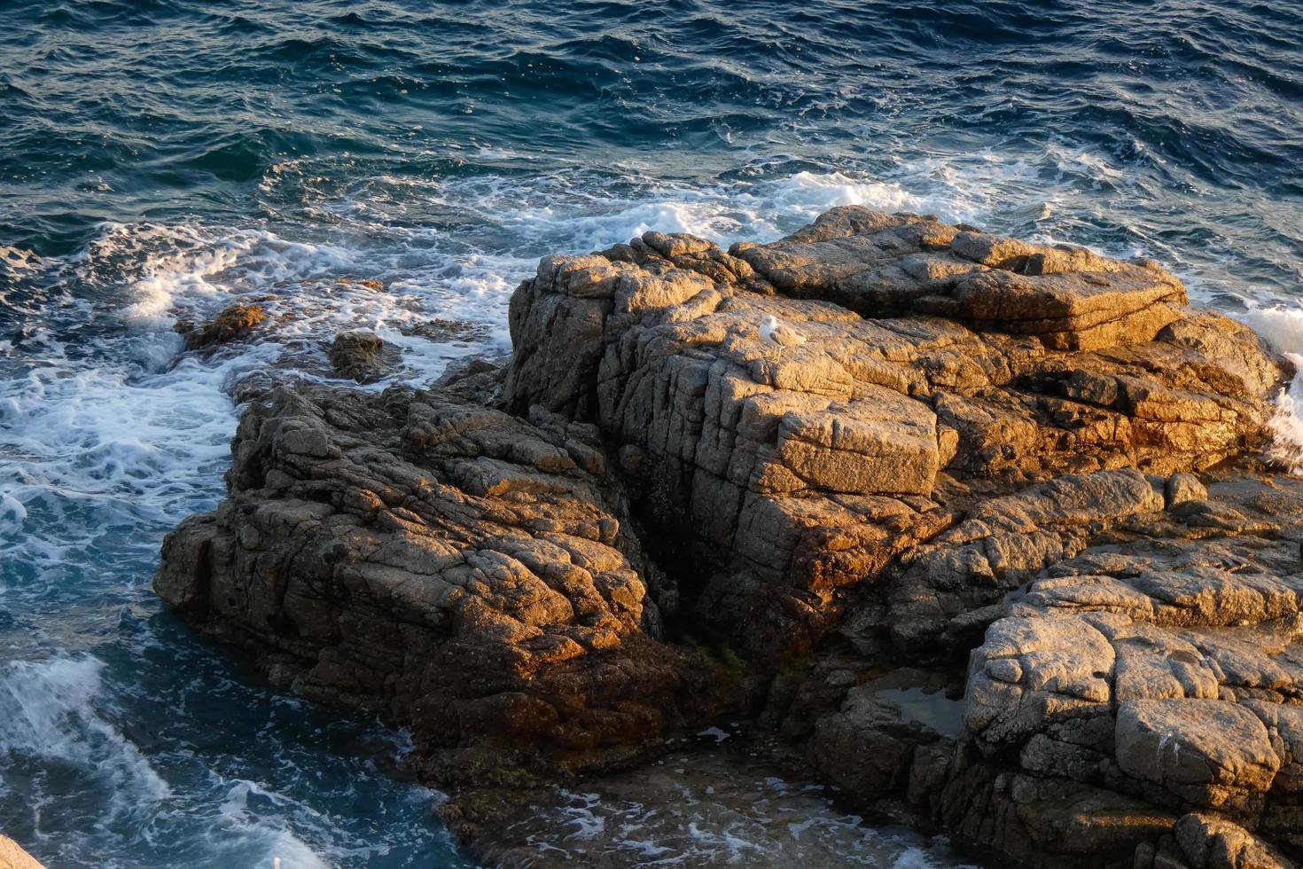 Rocks and sea in the catalan costa brava, mediterranean sea, blue sea photo