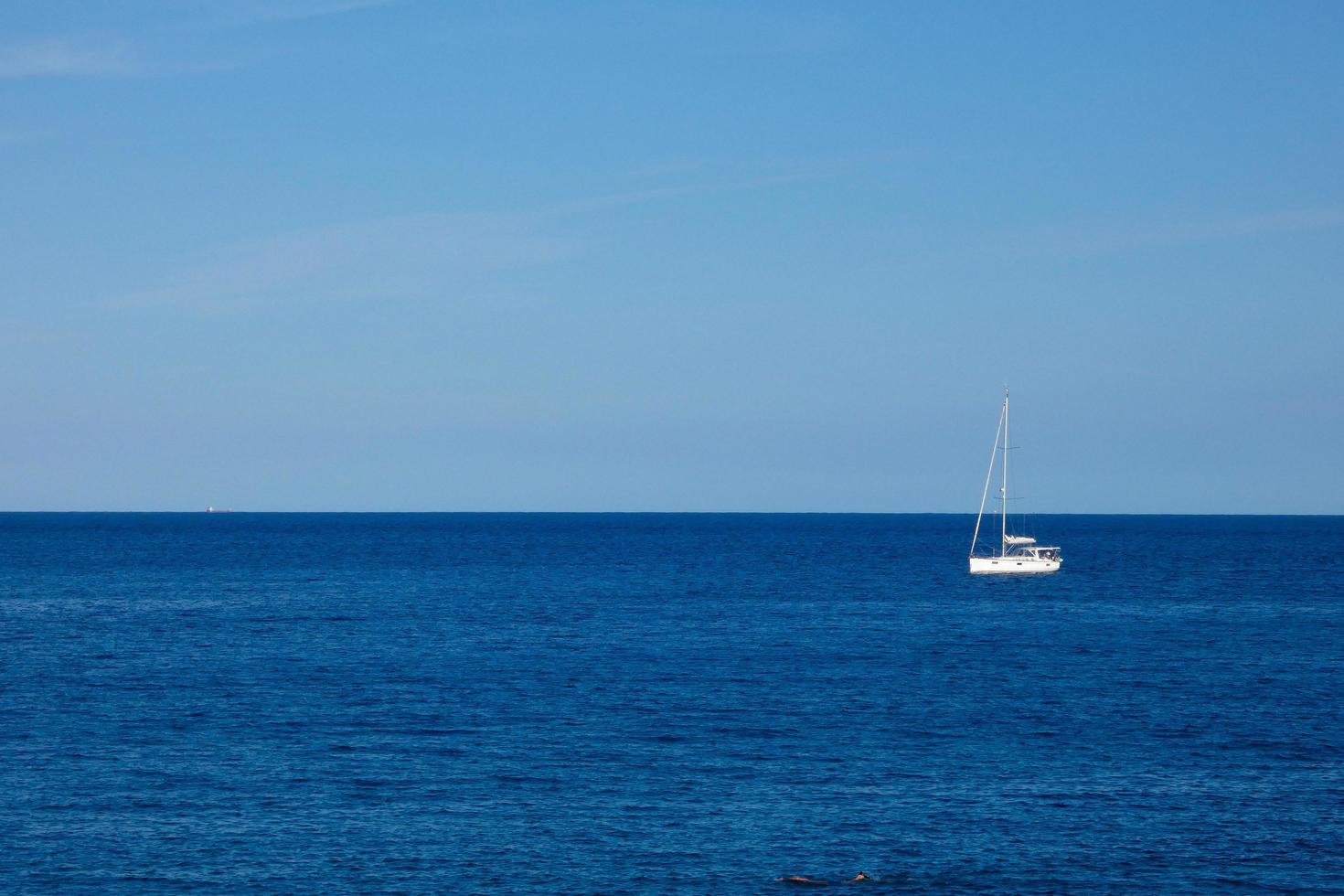Sailboat sailing in the mediterranean sea, calm waters photo