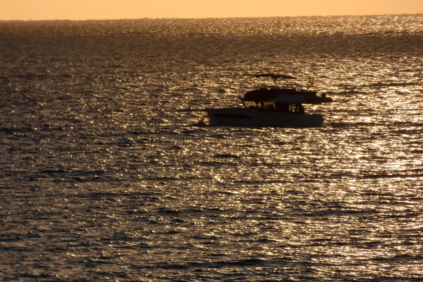 Fishermen returning from fishing at dawn after spending the whole night at sea. photo