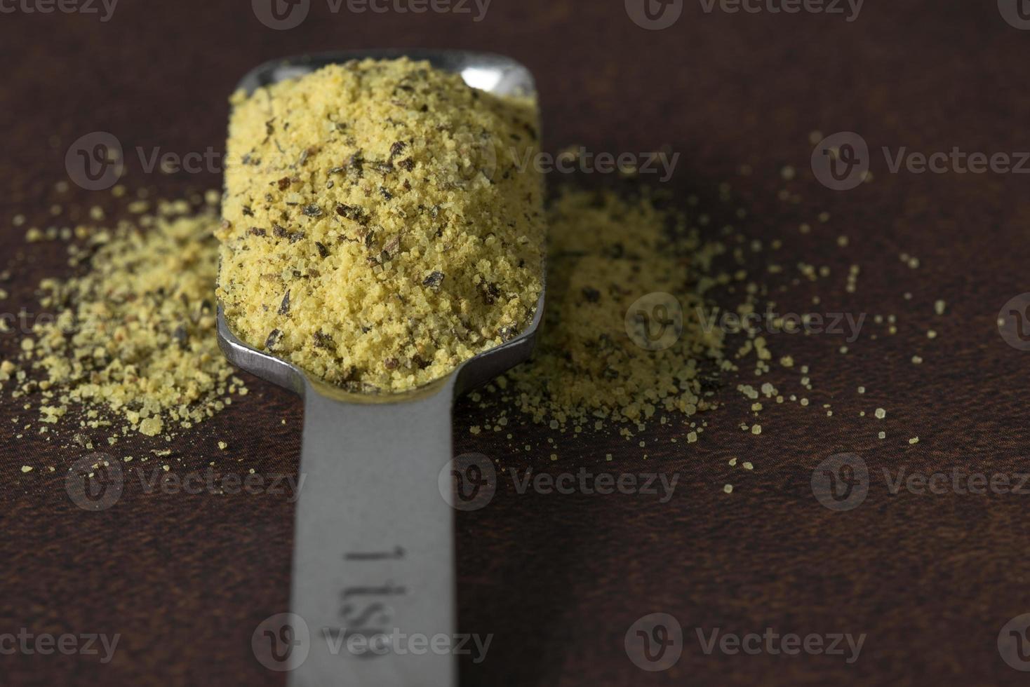 Lemon Pepper Seasoning Spilled from a Teaspoon photo