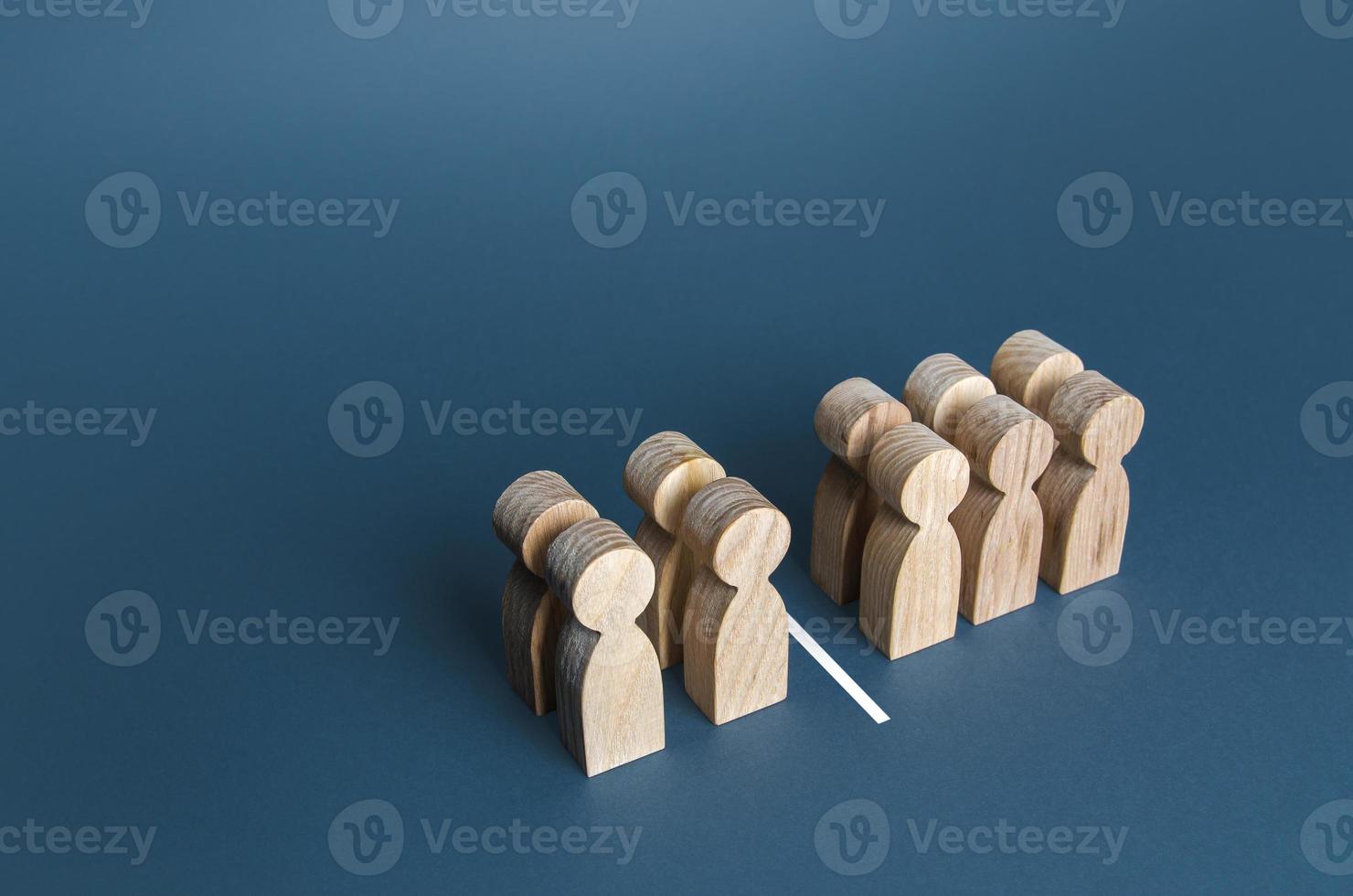 Four out of ten people separated by a line. Visualization of statistical data. 40 of 100. Polls test results. Equality in numbers. Dividing people into two groups on different issues. photo