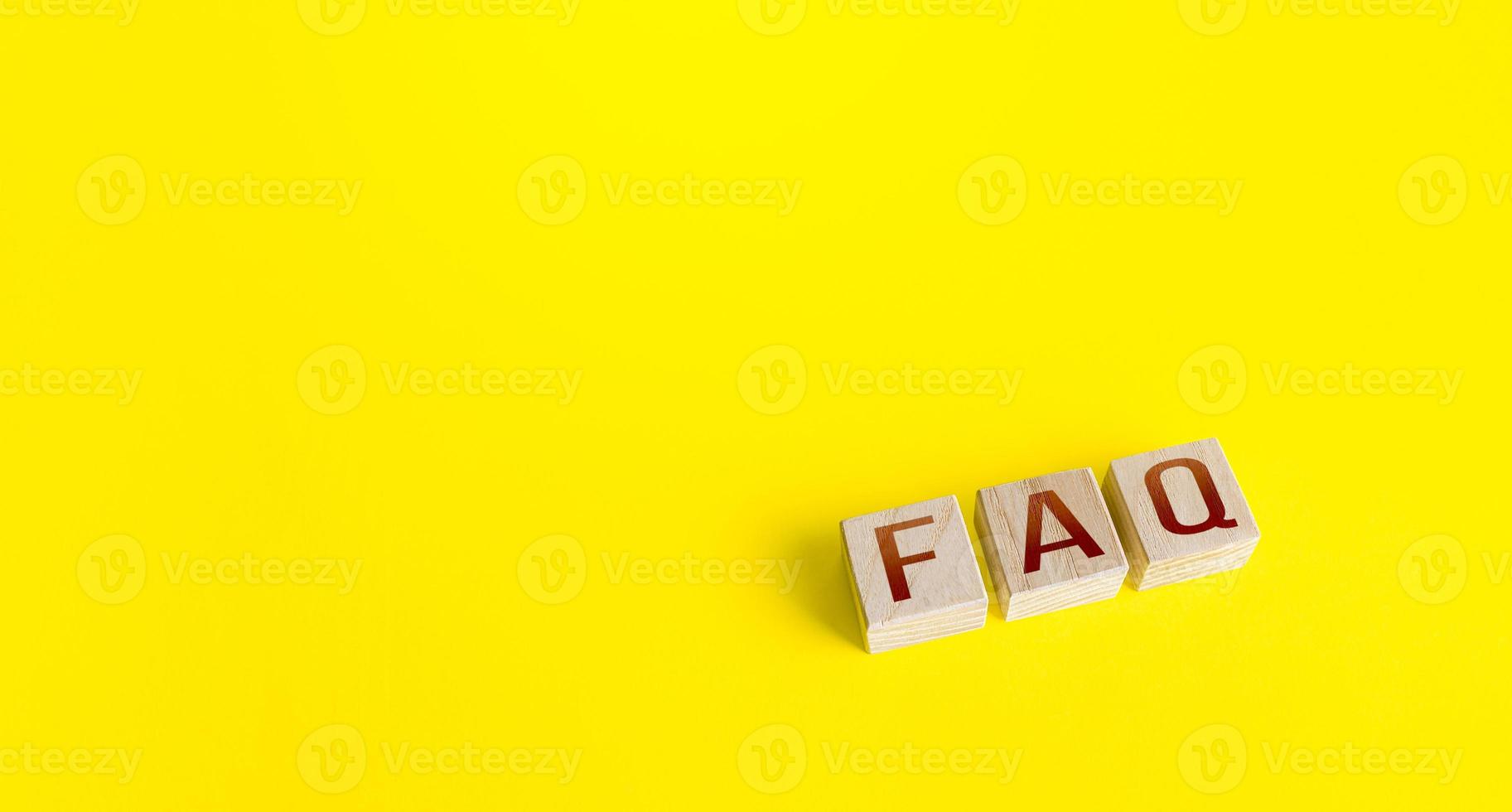 Blocks with the word abbreviation FAQ frequently asked questions on a yellow background. Answers explanations for users and customers. Instructions and rules. Guide and navigation. Tips and comments photo