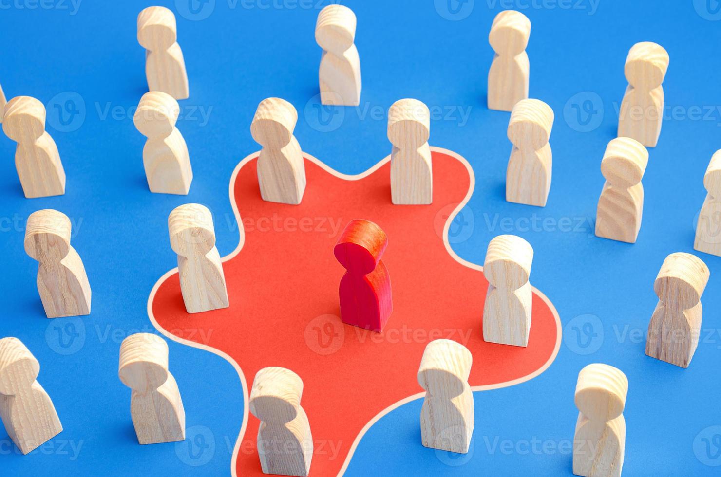 Red man spreads his influence over people around him. Unite people on a new idea. Employee toxicity. Collaboration, cooperation. Recruiting followers. Influencer manipulator, intriguer. photo