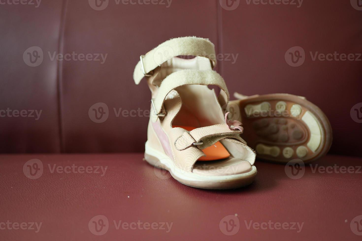 Child cerebral palsy disability, legs orthosis. photo