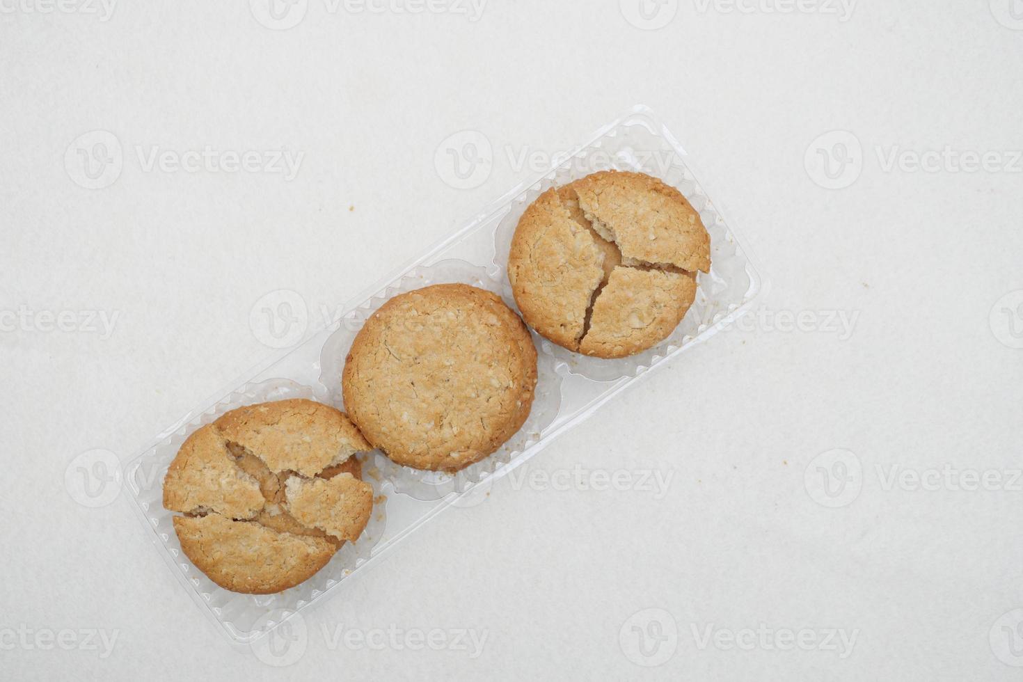 close up of cheese cookies in a packer on table photo