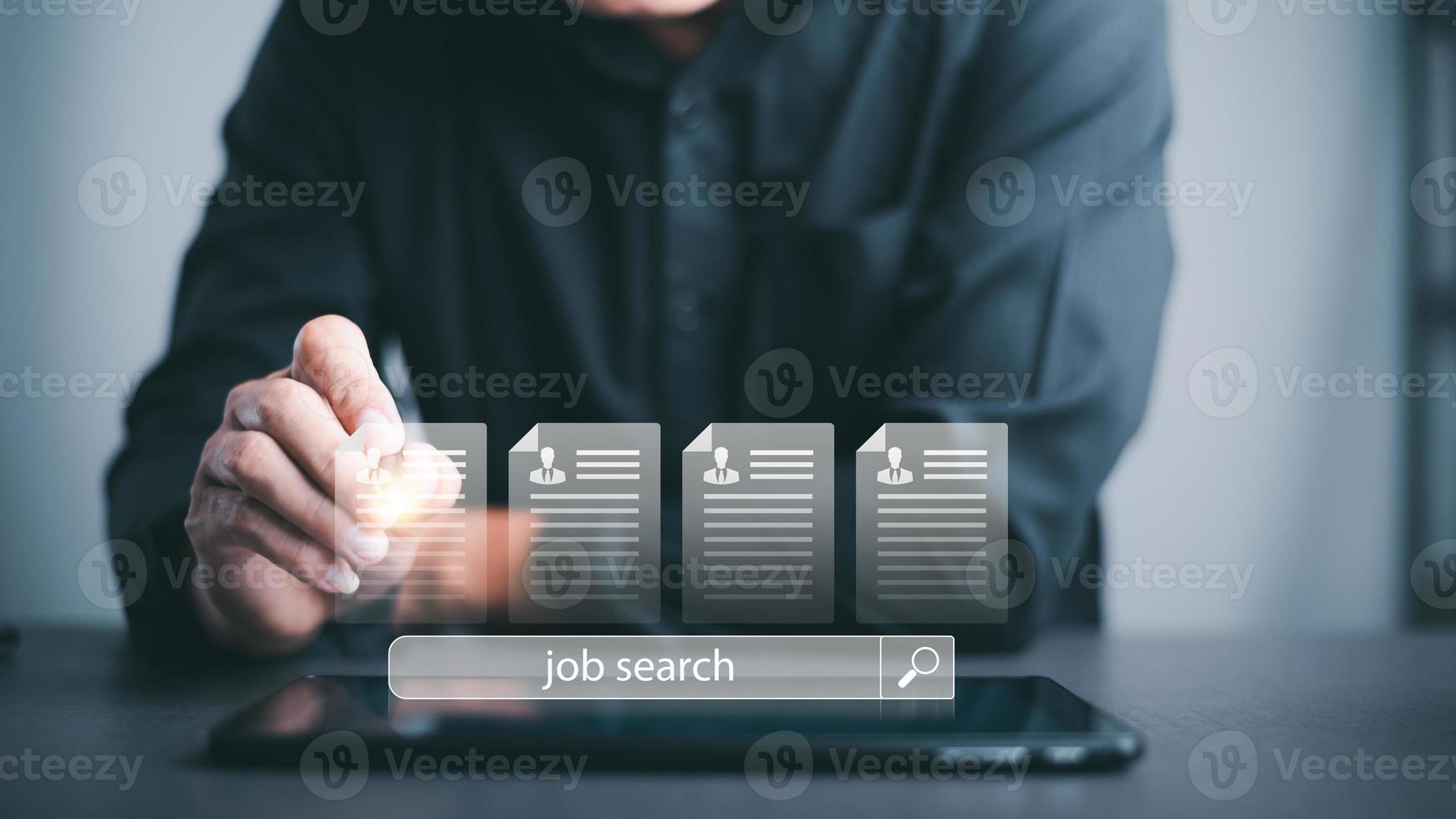 Men read online job application information, career search ideas, recruitment, HR search, form websites and job applications, managing agency employment with internet technology. photo