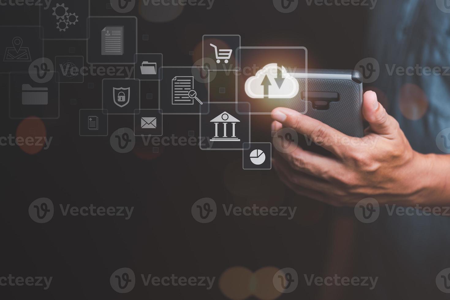 Cloud computing concept, smartphone in man's hand, digital network data connection technology, modern communication with information technology, innovation online backup with highly secure protection photo