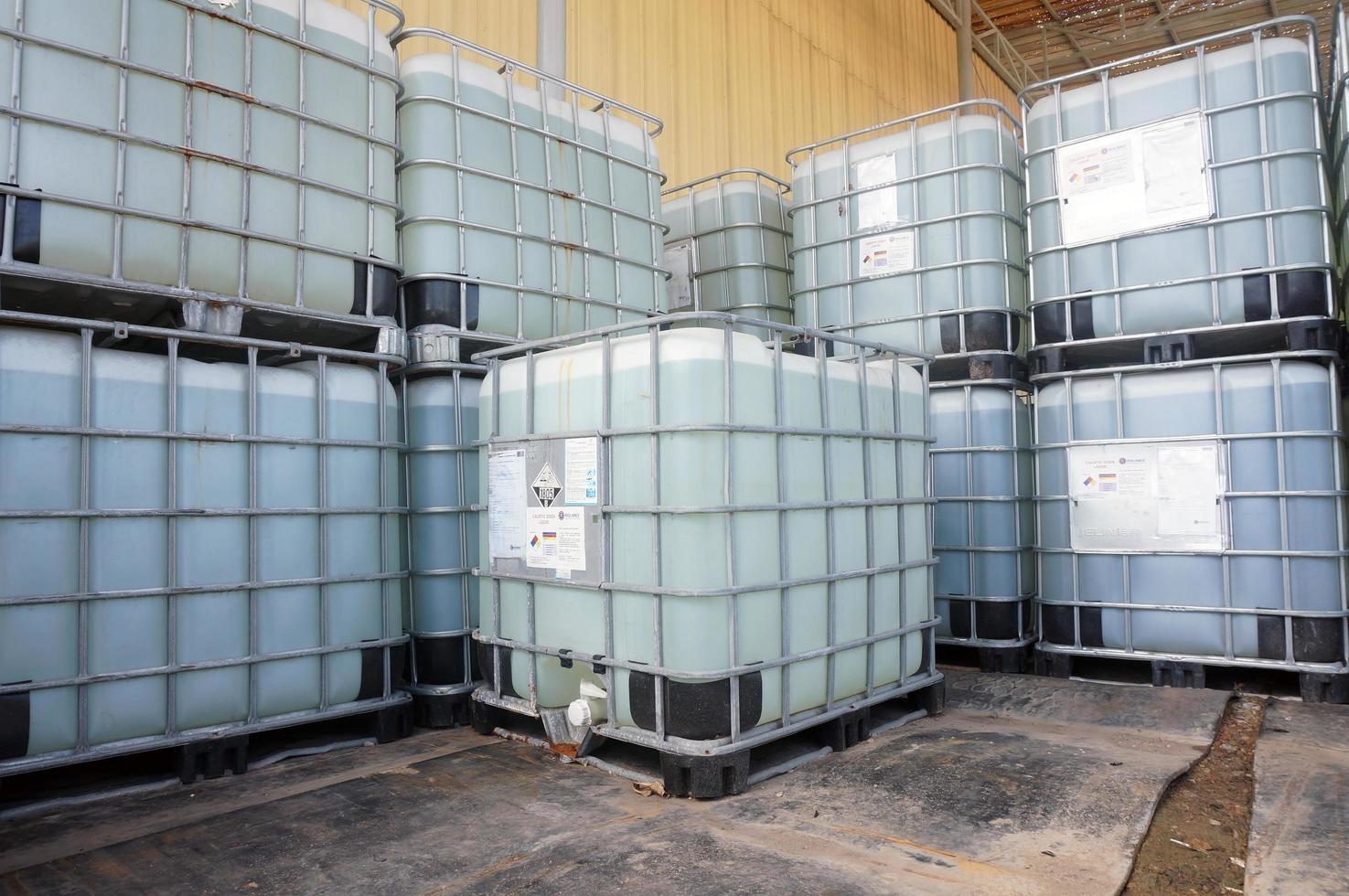 Sangatta, East Kalimantan, Indonesia, 2020 - IBC Tank for caustic soda liquid. photo