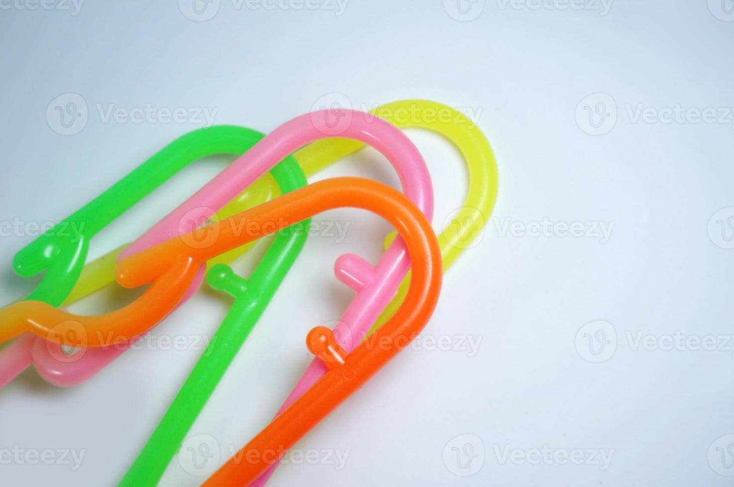 Collection Of Colorful Plastic Hangers On White Stock Photo