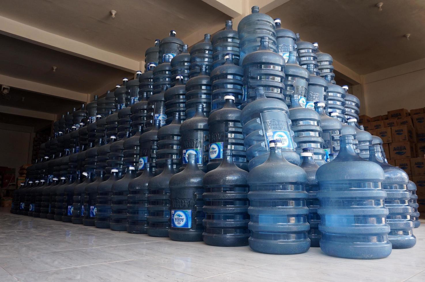 Sangatta, East Kalimantan, Indonesia, 2020 - Empty Mineral water gallon brand Aqua on display for sell in the supermarket. photo